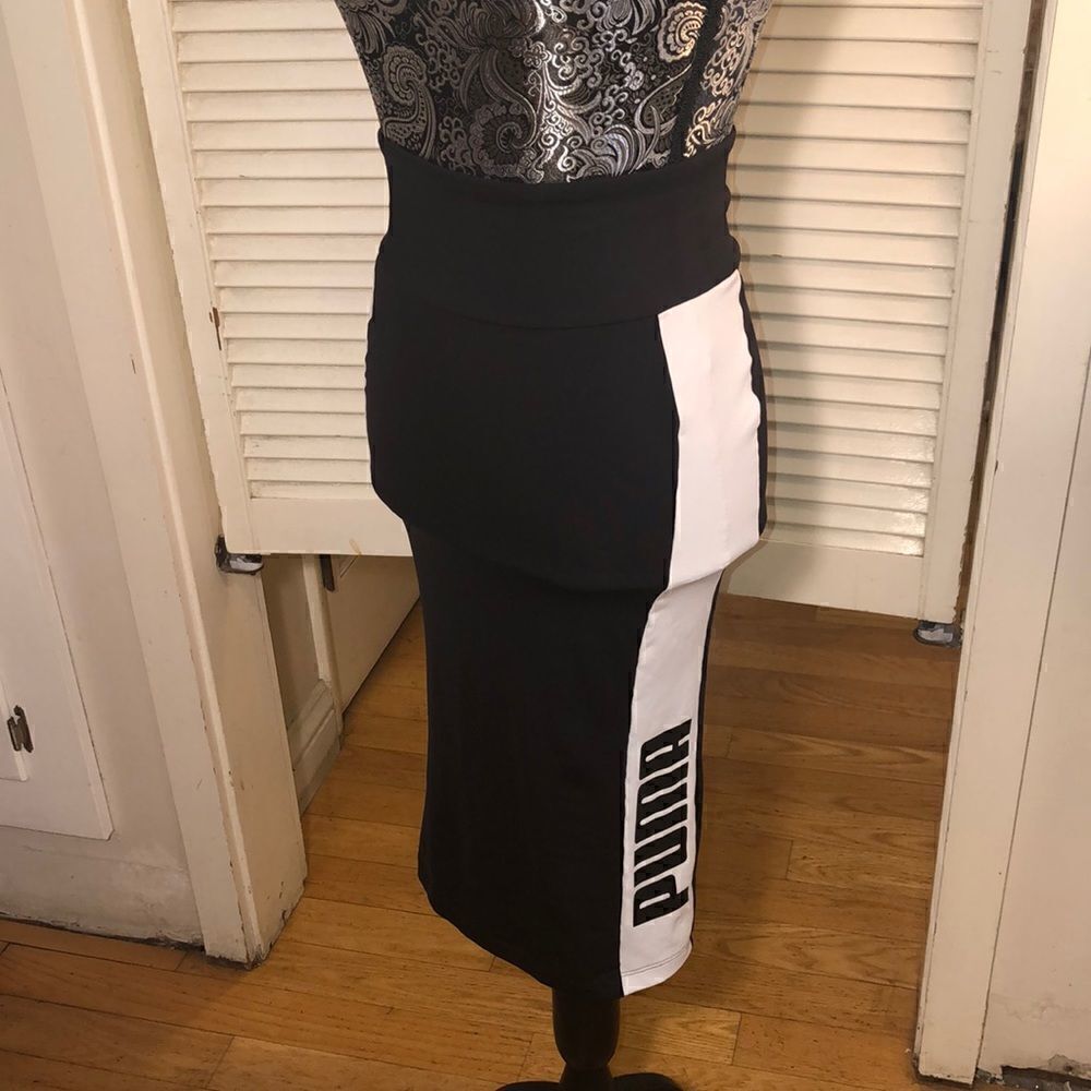Puma Highwaisted Stretch Midi Side Stripe Play Skirt. Play all day and night!